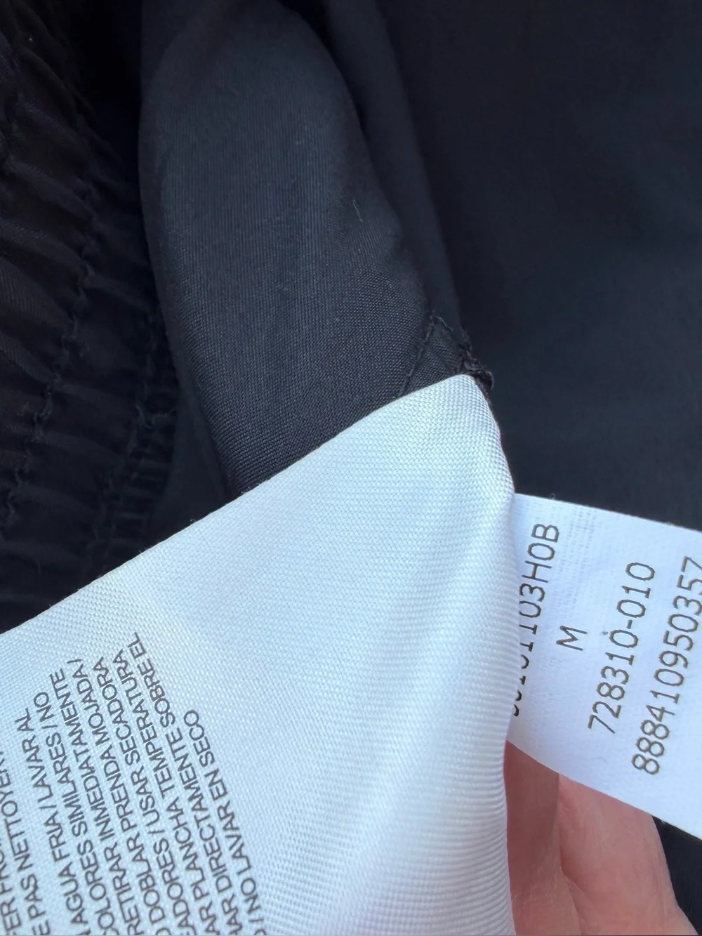 Nike Black running pants with White Care Tag